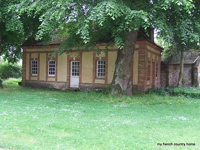 visiting-valley-rose-gardens-miserey-my-french-country-home small brick outbuillding
