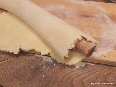 pastry dough rolled around a rolling pin