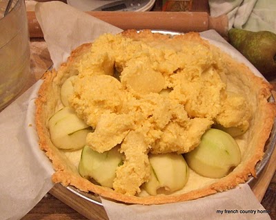 almond mix on top of the pears in a tarte shell