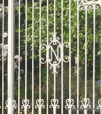 early-sunday-brocante-my-french-country-home 'N' monogram in a white wrought-iron gate