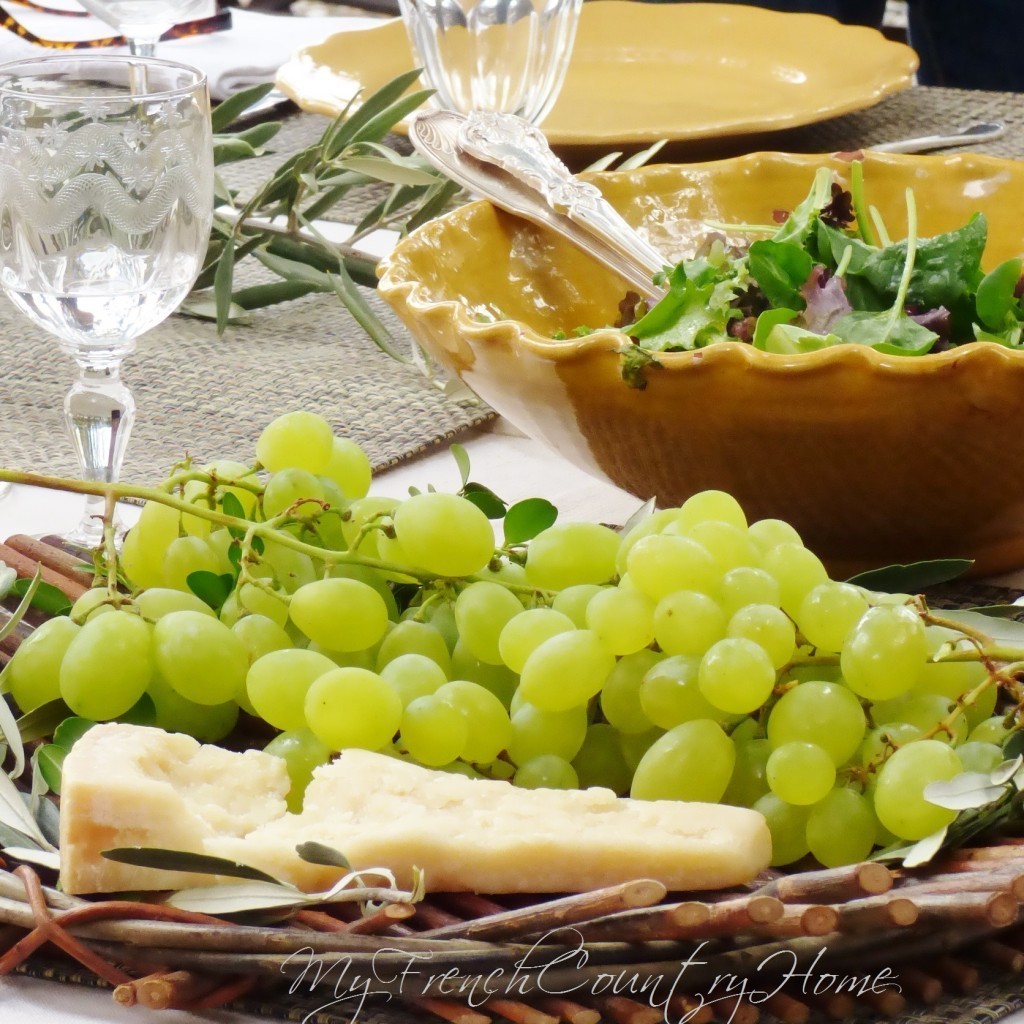 cheese and grapes at the end of the meal