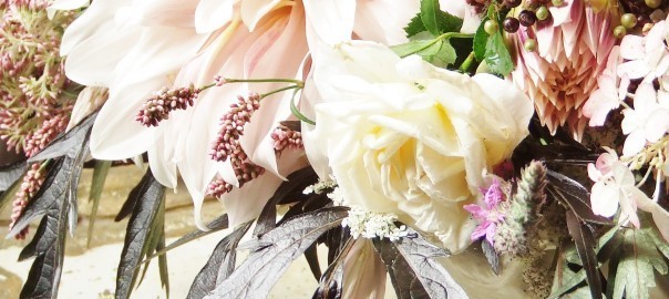 bouquet of dahlias and elderberies on a table