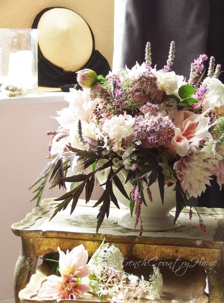 bouquet of dahlias and elderberies on a table