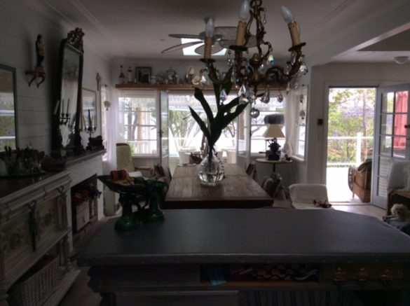 real-french-kitchens-home-pics-my-french-country-home large kitchen with fireplace and farm table and chandelier