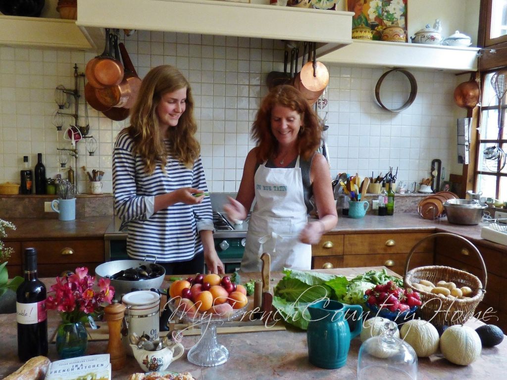 two women in a french kitchen