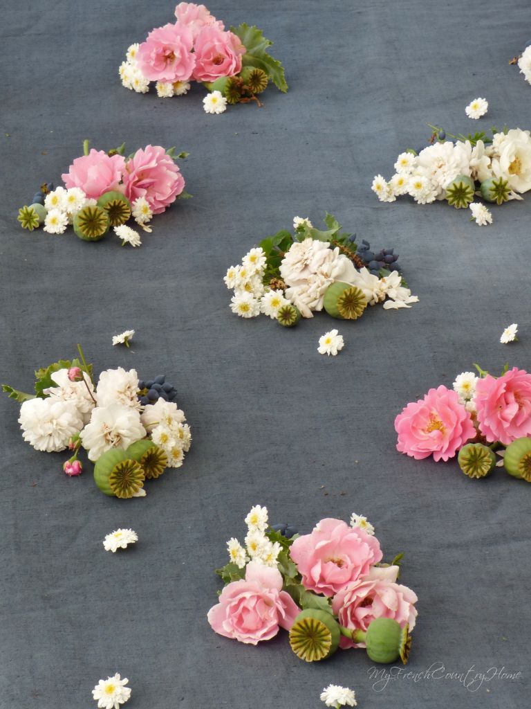 repeat pattern of flowers arranged on cloth