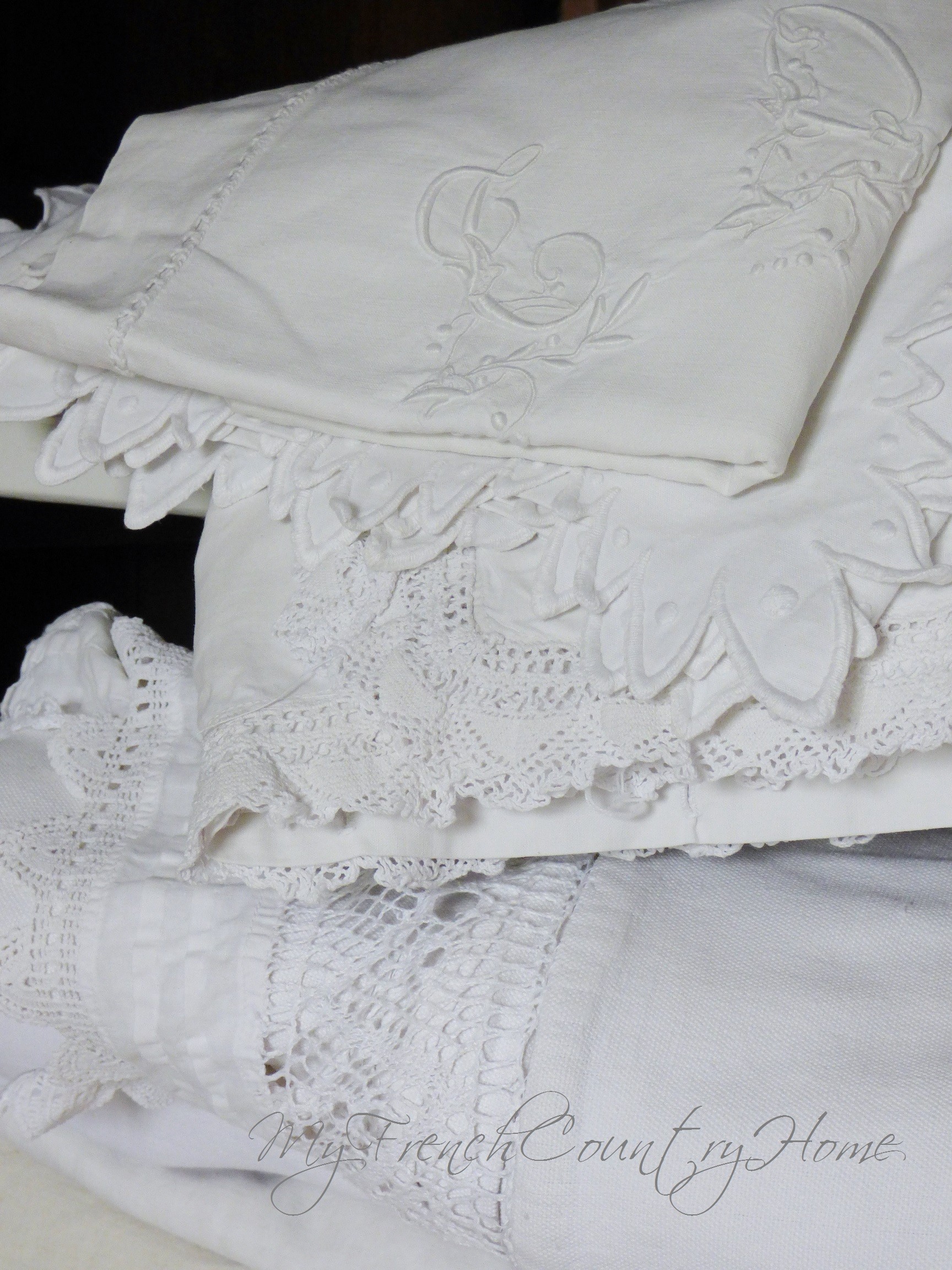 french linens in cupboard