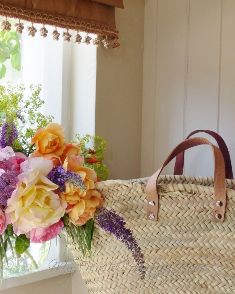 roses arranged with Amarket basket