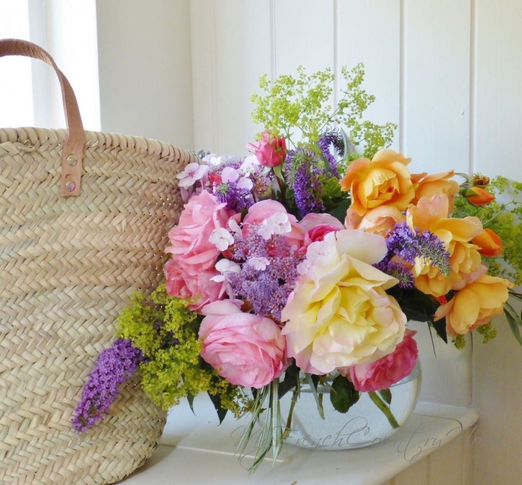 roses arranged with Amarket basket