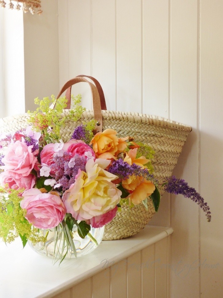 roses arranged with Amarket basket