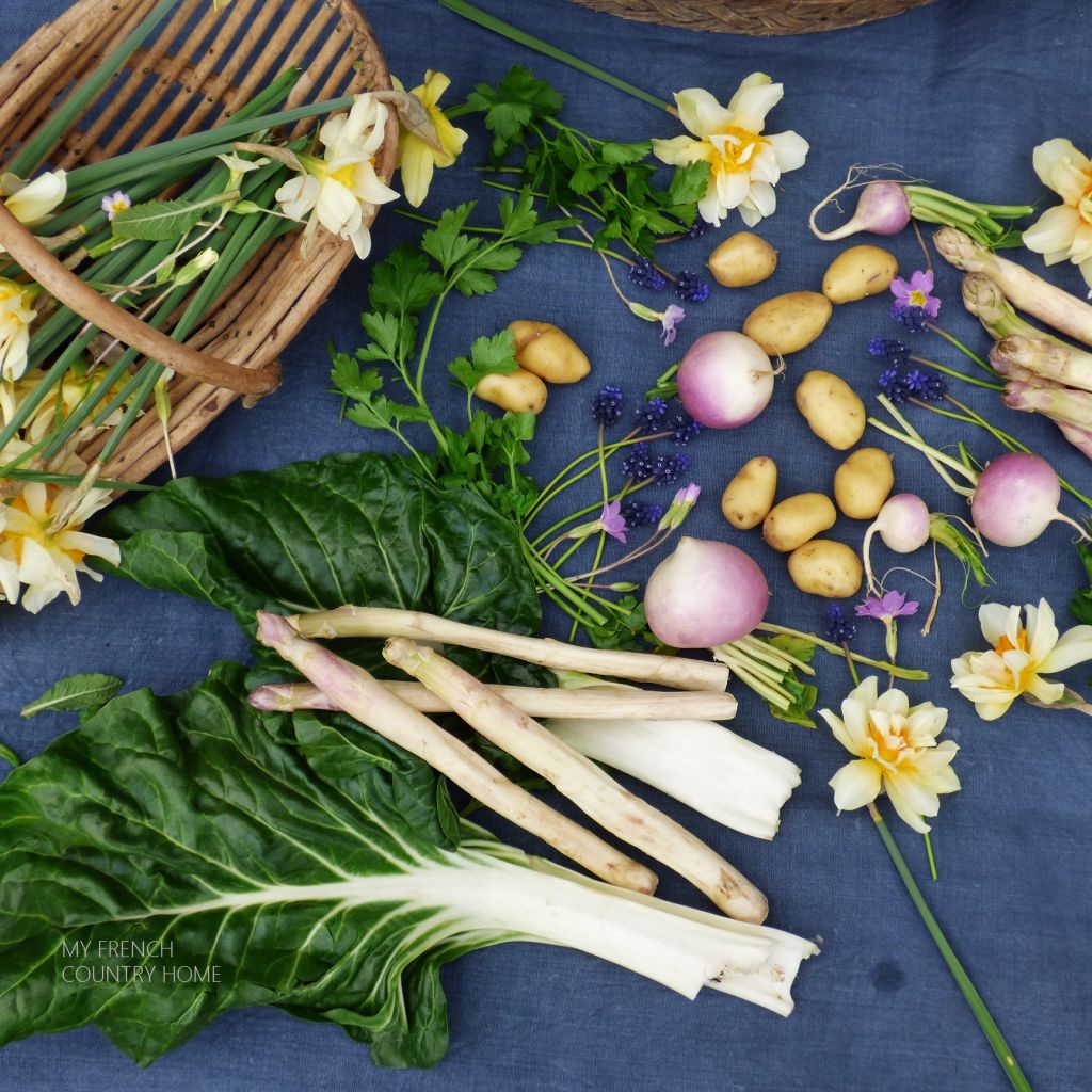 spring vegetables on blue cloth