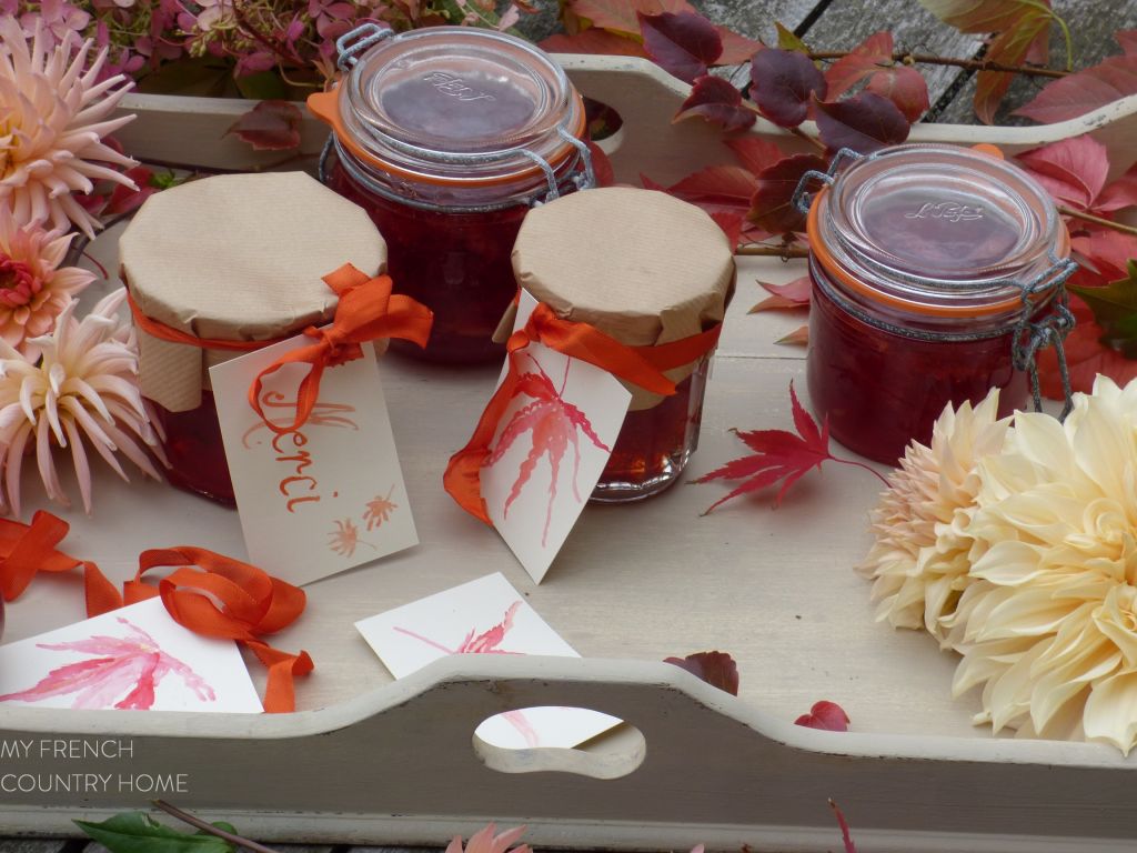 jars o quince jelly on a tray