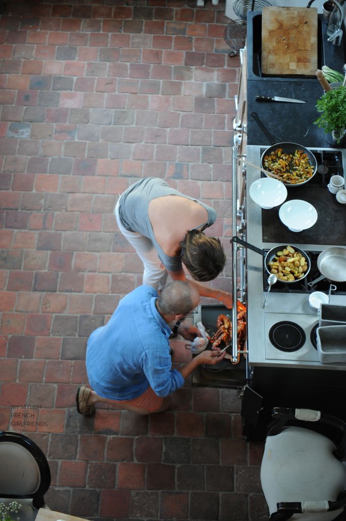 taking food from the oven of a La Cornue stove