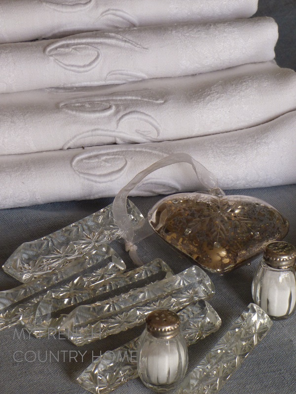 preparing a christmas table in grey