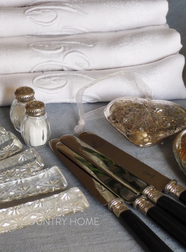 preparing a christmas table in grey