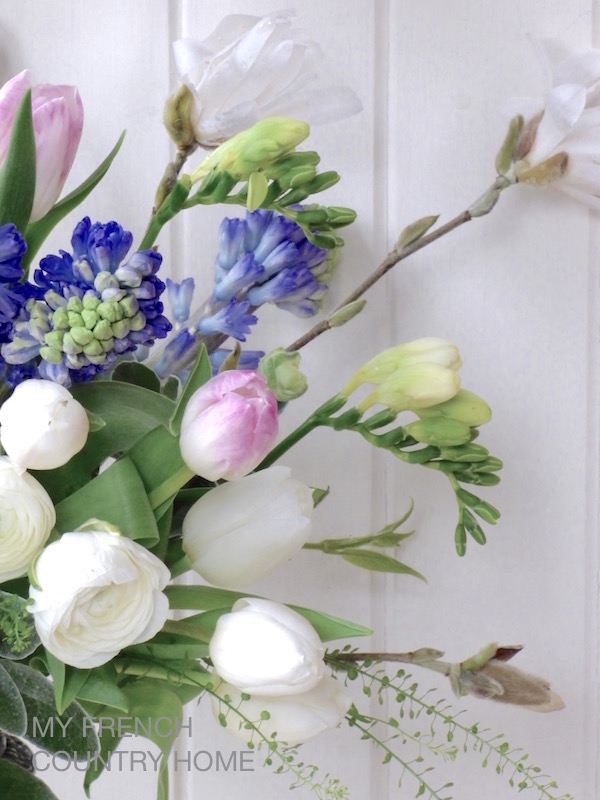 sprig flowers on white background
