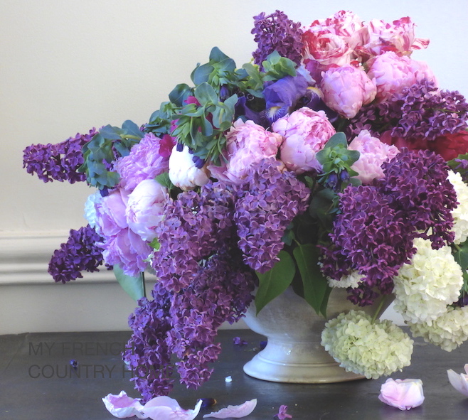 lilac in bouquet with roses and peonies