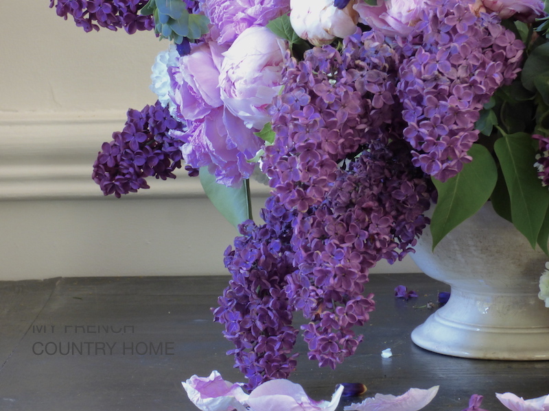 lilac in bouquet with roses and peonies