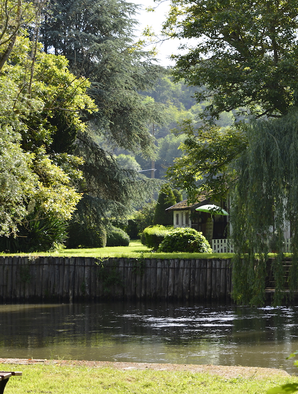 house by river