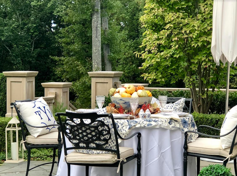 outdoor dining tablescape with flowers