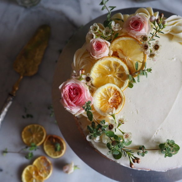 A beautiful lemon cake filled with lemon curd and iced with a vanilla bean buttercream, by Molly Wilkinson for My French Country Home