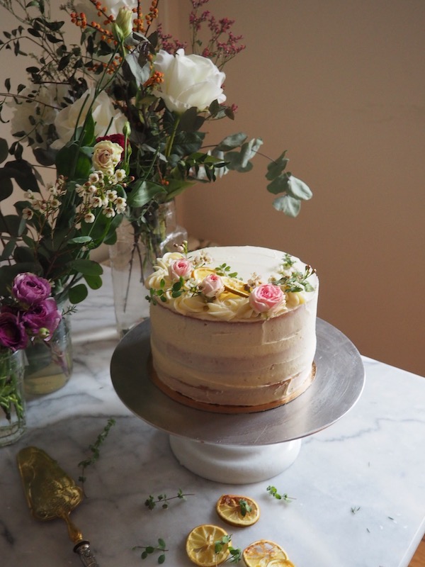 A beautiful lemon cake filled with lemon curd and iced with a vanilla bean buttercream, by Molly Wilkinson for My French Country Home