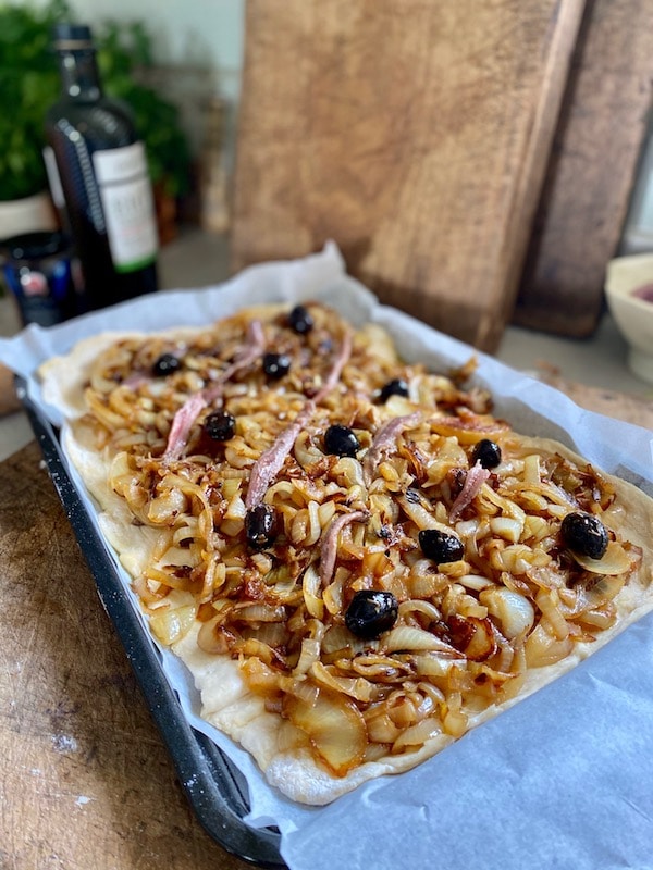 french onion tart with anchovies and olives