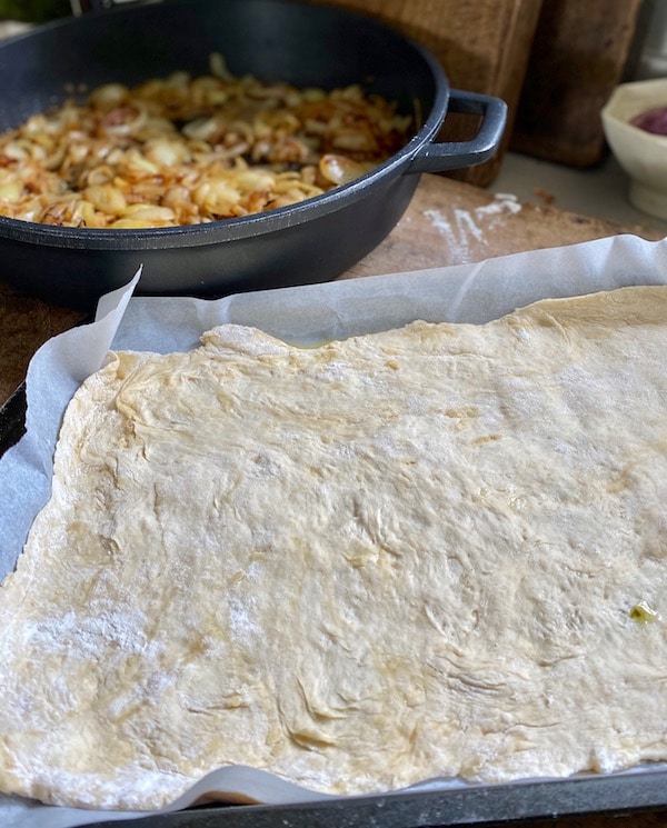 dough and onions ready to make tart