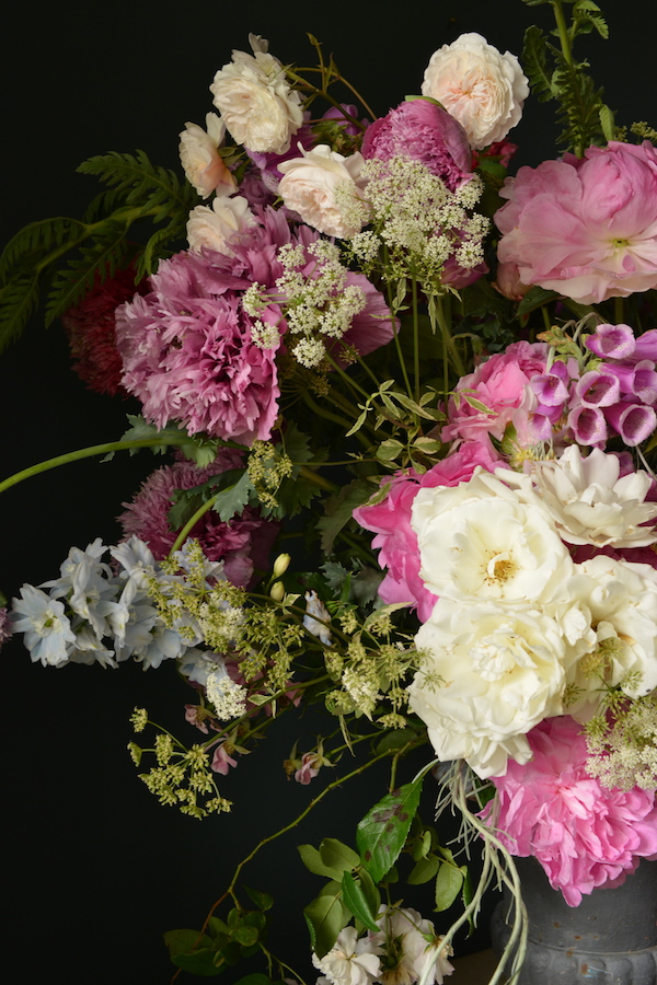 detail of pink bouquet with roses and peonies