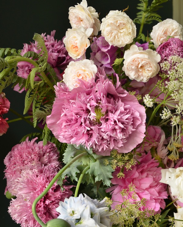 detail of pink bouquet with roses and peonies