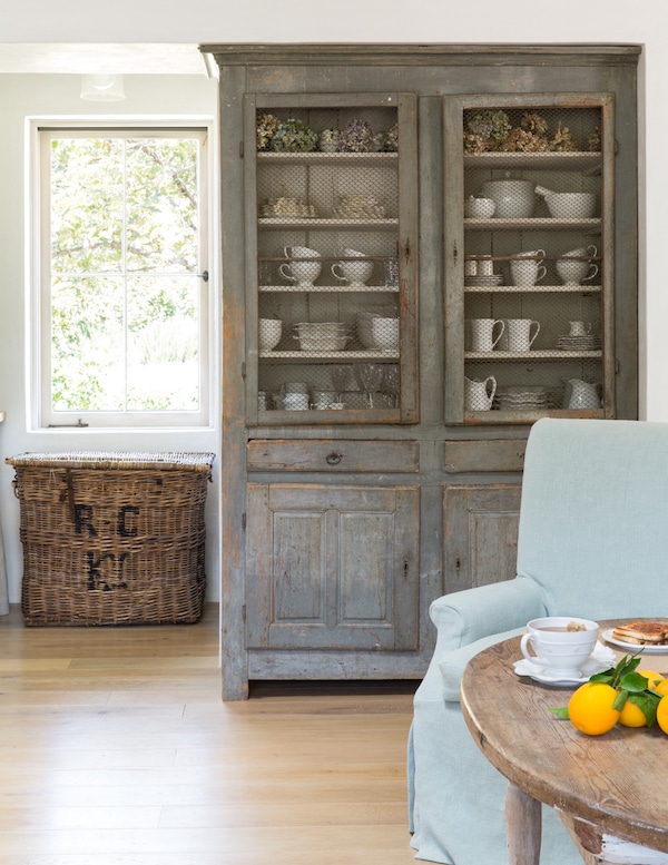 kitchen with grey cupboard and wood floors