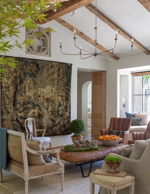 living room of farmhouse with wooden beams