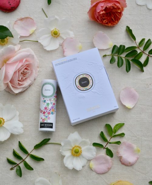 A colorfully packaged scented balm